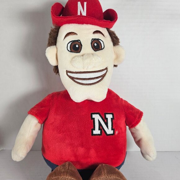 Nebraska Cornhuskers Reverse-A-PAL Plush Toy NCAA, Stuffed Mascot And Football - Picture 1 of 10